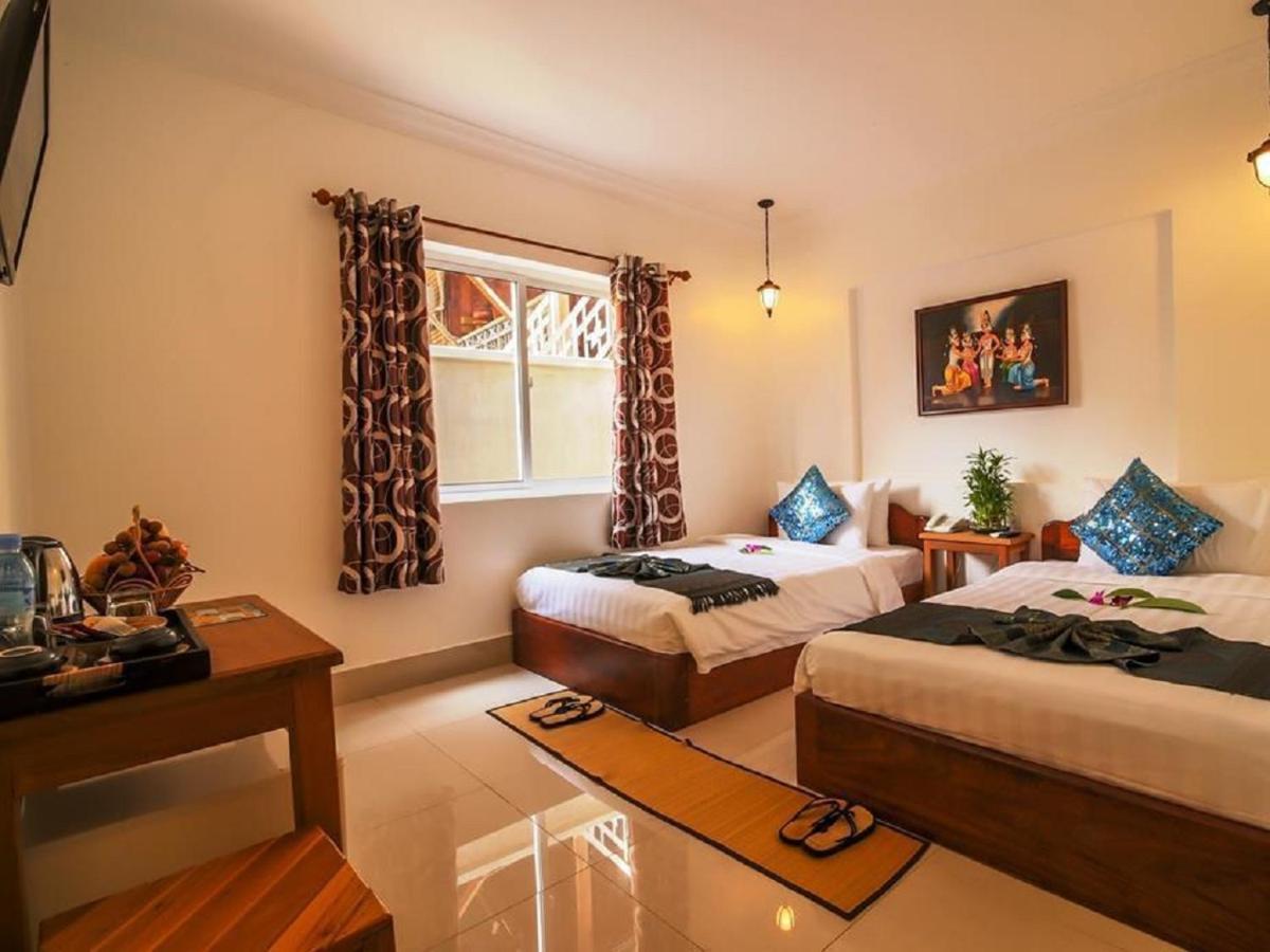 Plumeria Hotel & Spa Siem Reap Bagian luar foto